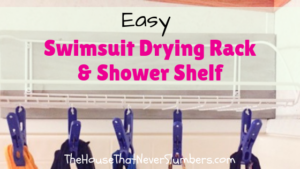 This easy shower shelf is the best solution for drying swimsuits without a mess this summer. #pool #swimmingpool #swimsuits #showershelf #bathroom #momhacks #summervacation