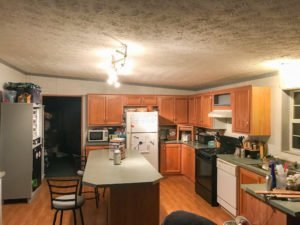 honey oak kitchen before countertop refinishing project